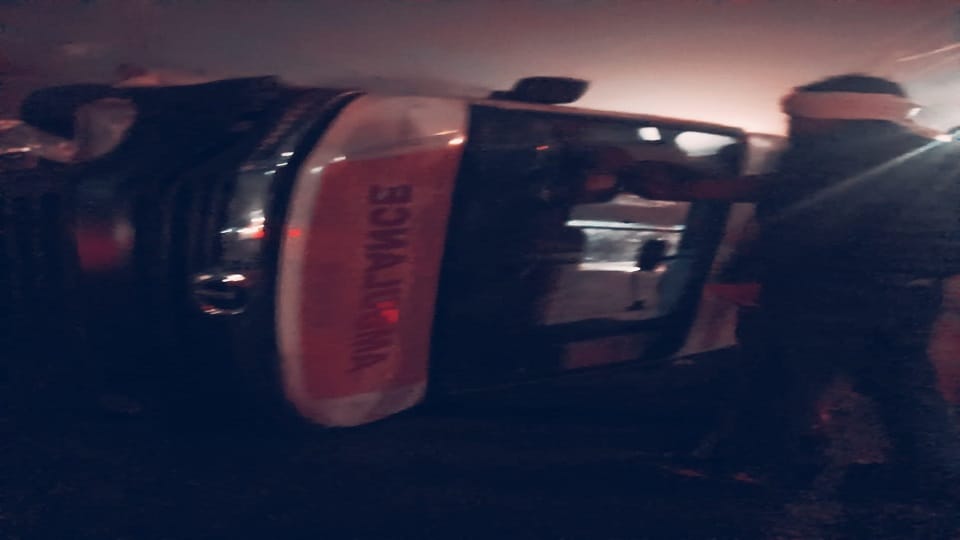 Ambulance overturns out of control