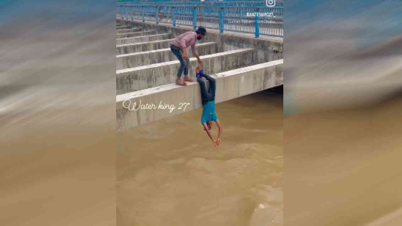 Instagram Reels Viral Challan issued to youths jumped into Ganga canal with their hands tied dangerous videos