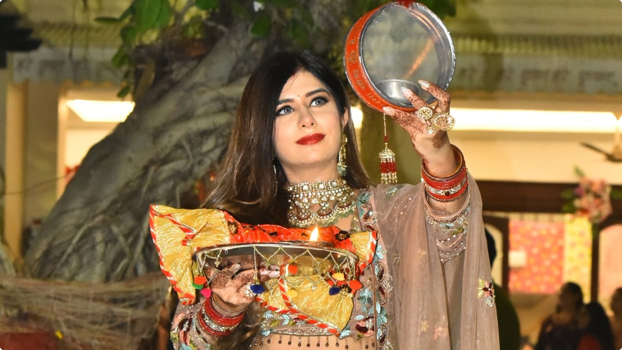 karwa chauth 2024 photos women completed their fast by offering water to the moon