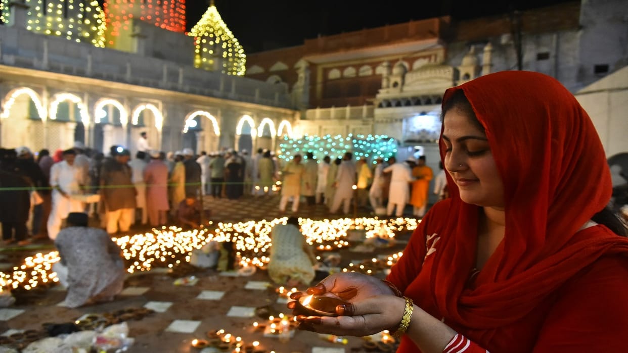 The lamps of wishes lit up the Khanqah was bathed in the light of harmony.