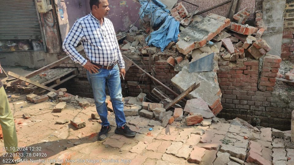 Shops were built on the drain itself Municipal Corporation demolished them using a bulldozer