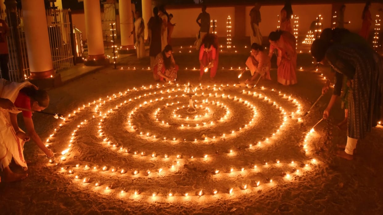 diwali 2024 celebrations lighting diyas sweets festive moments people joy photos