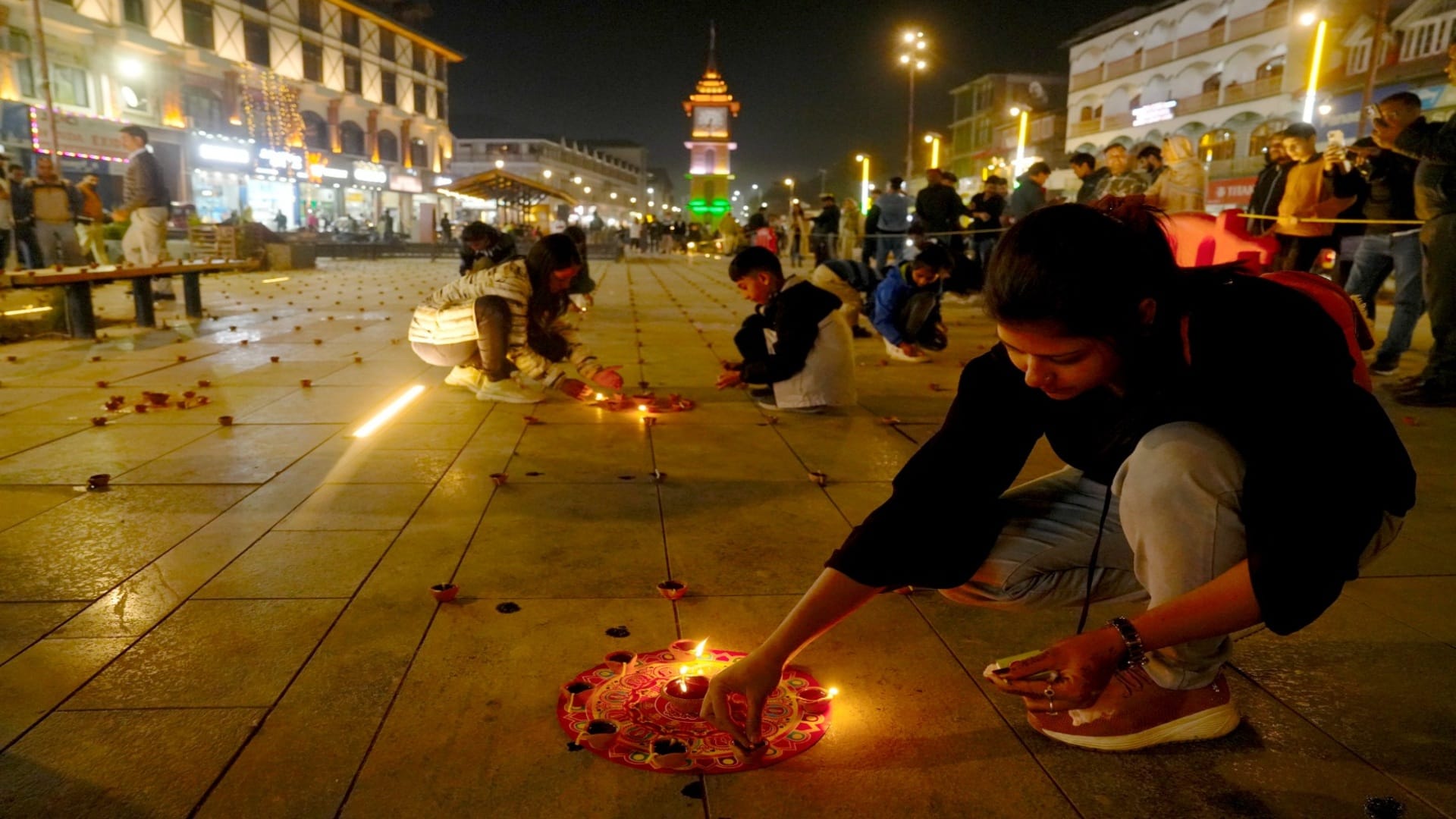 diwali 2024 celebrations lighting diyas sweets festive moments people joy photos