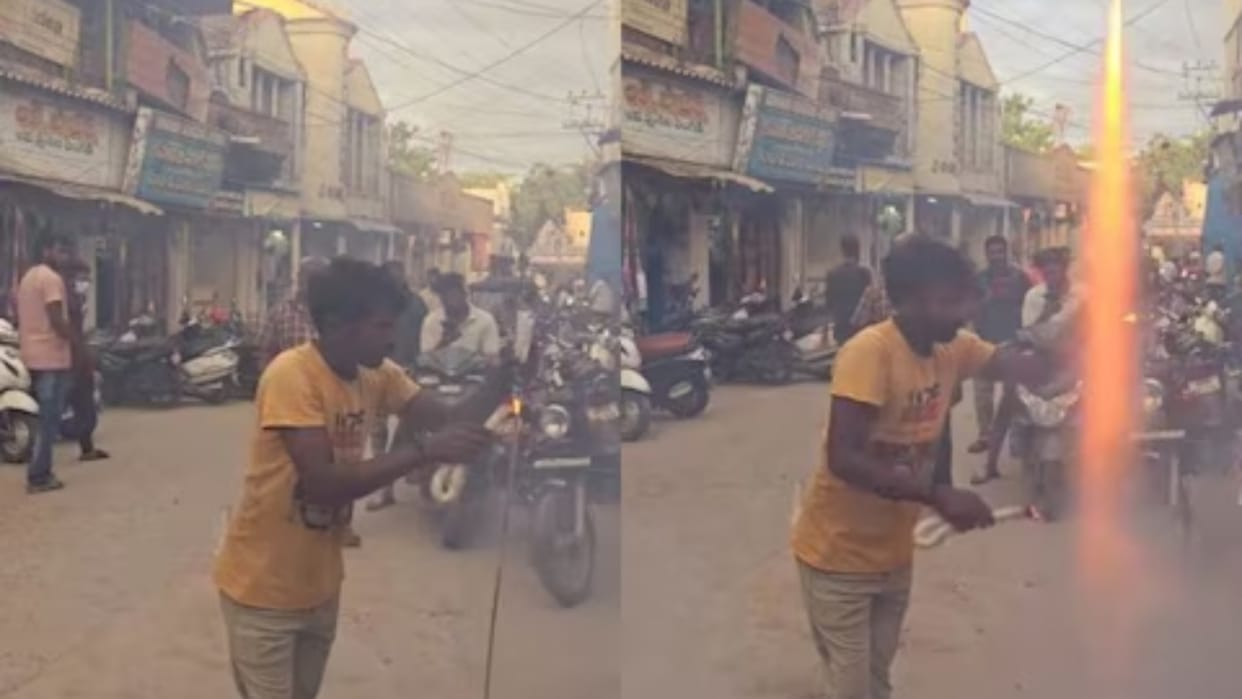 viral Video man light rockets with hand in burning fire crackers with hands viral video on social Media