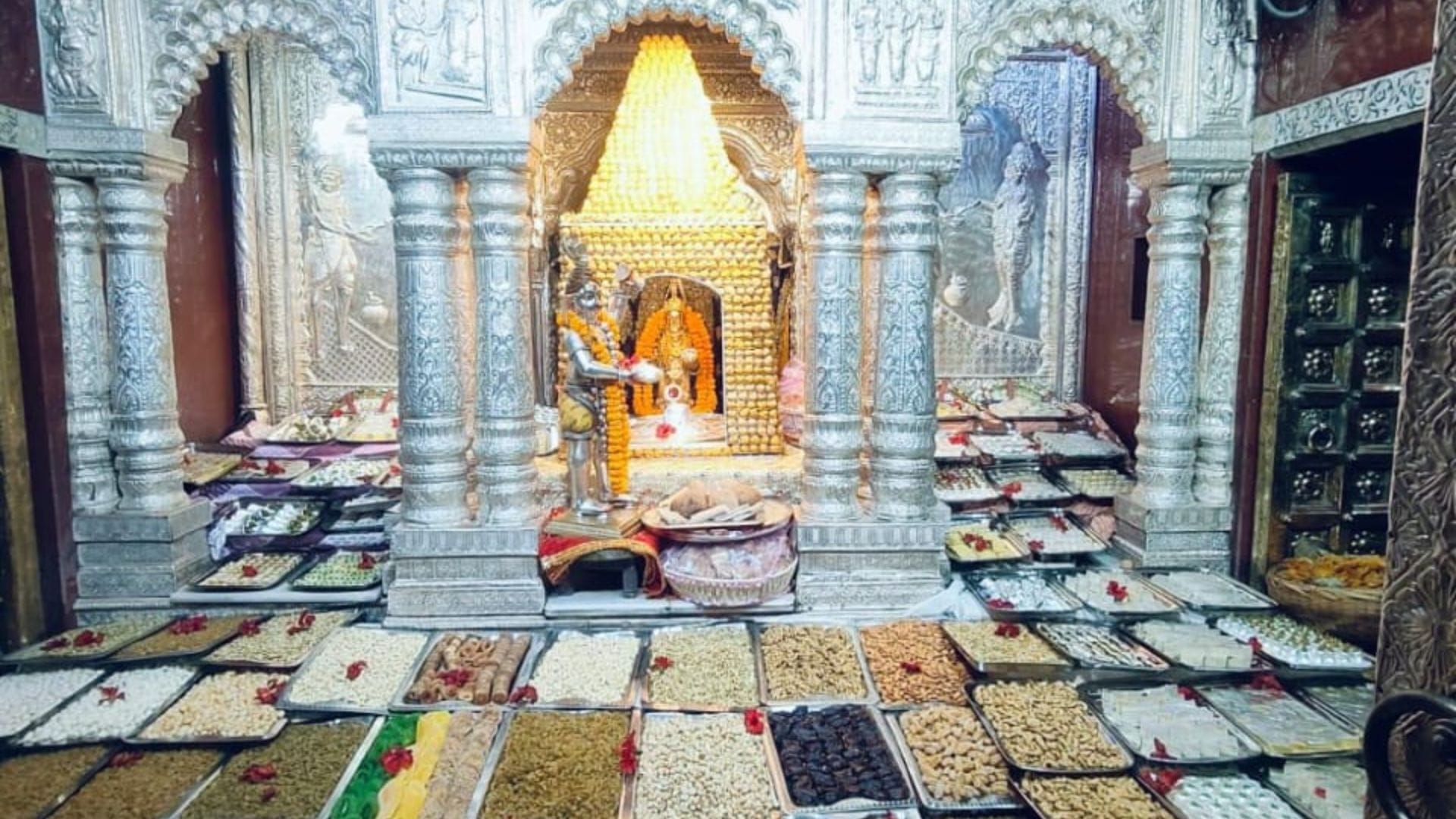 Annakut was celebrated in temples 56 dishes were offered crowd of devotees gathered see photo gallery