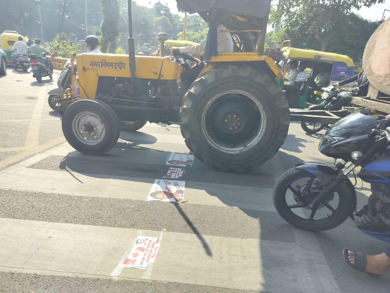 Indore: Congress protested against the violence in Canada, pasted posters of Canada PM on the road.