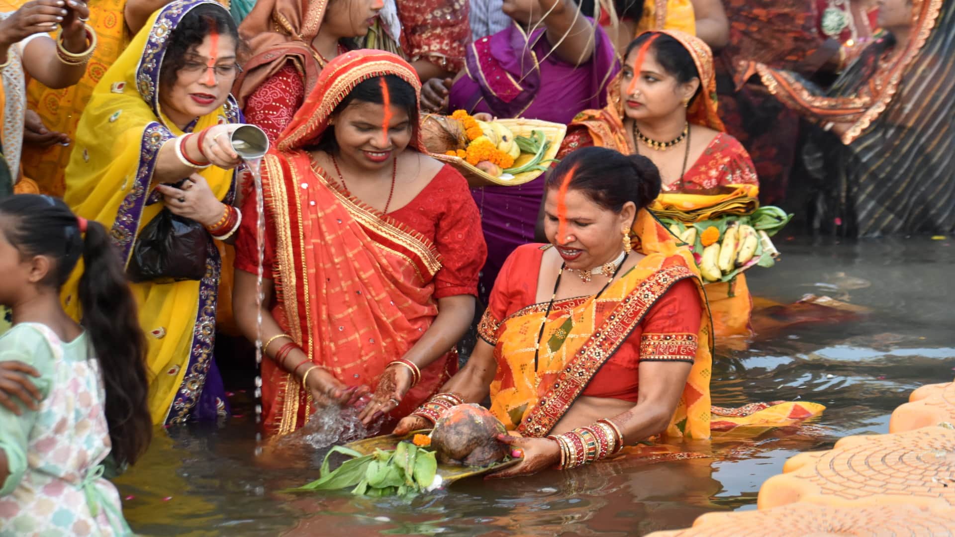 Chhath Puja 2024: Women stood in water and offered Arghya to the setting sun