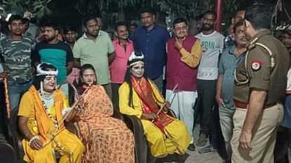 Ram-Lakshman and Sita sit on protest outside the police station in Shahjahanpur