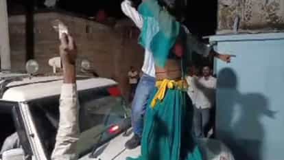 people climbed on SDM car and kept dancing and playing hooter in Jhansi