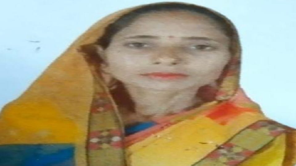 Woman dies in collision with bus and bike