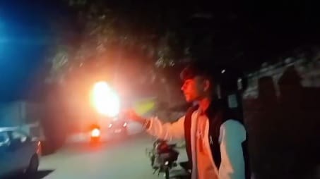 He was making reel by playing with embers the youths face caught fire and got burnt kept shouting bring water
