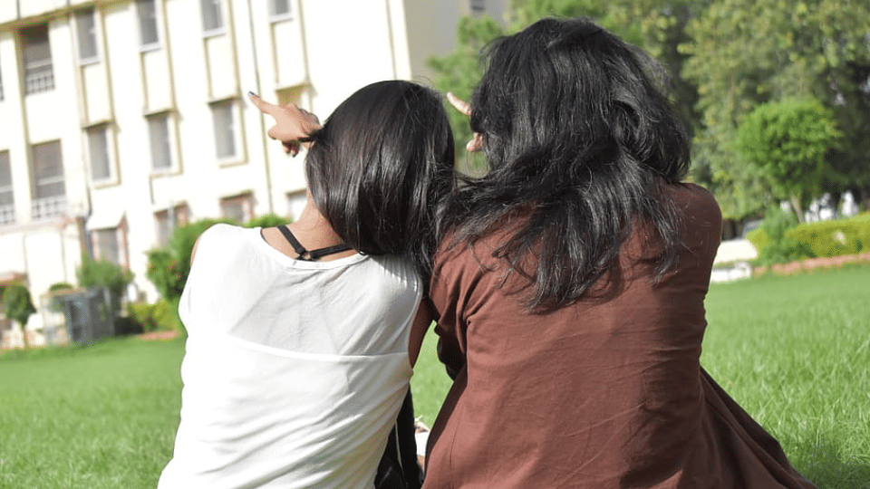 indore news college girls exam checking nakal cheating case davv