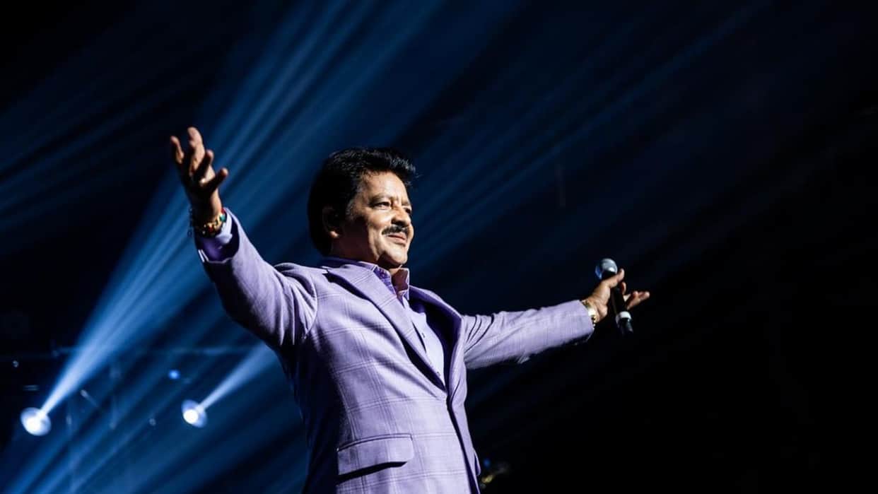 Udit Narayan Kisses Female Fans During Concert Social Media User Reacts with Anger