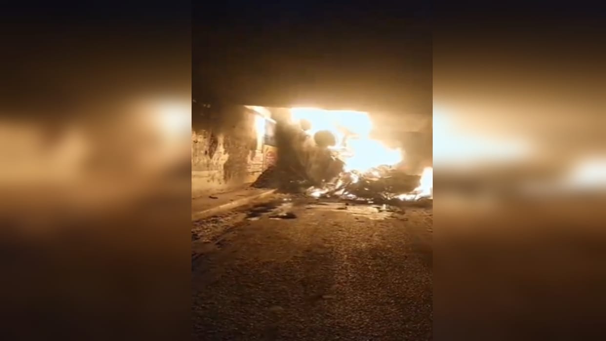 Truck loaded with coal overturned after fire, driver burnt to death
