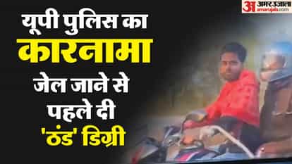 up police constable made handcuffed prisoner ride bike himself sat behind wearing a helmet