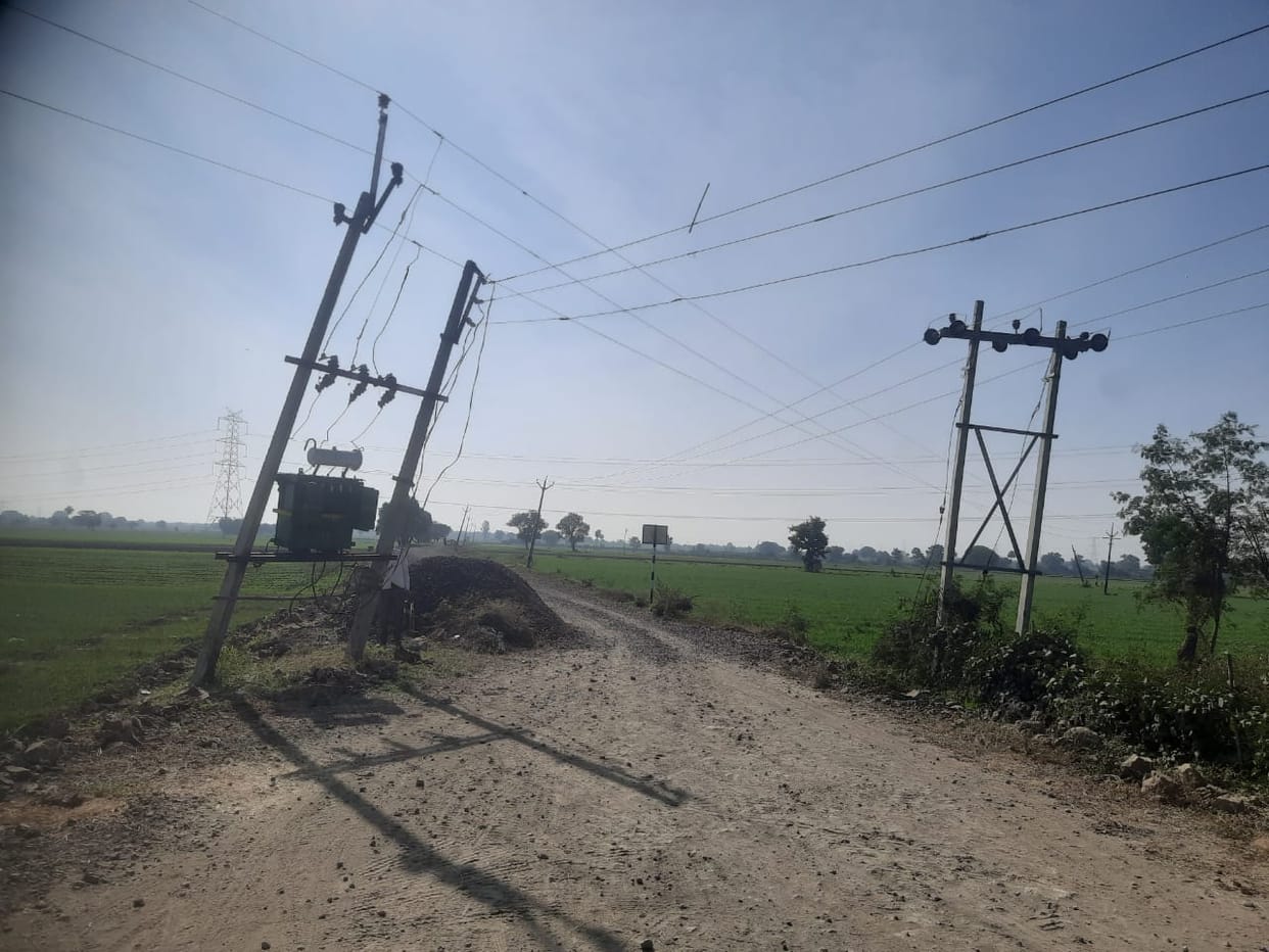 Indore: PWD built incomplete road of Tillaur village, left construction around electricity pole