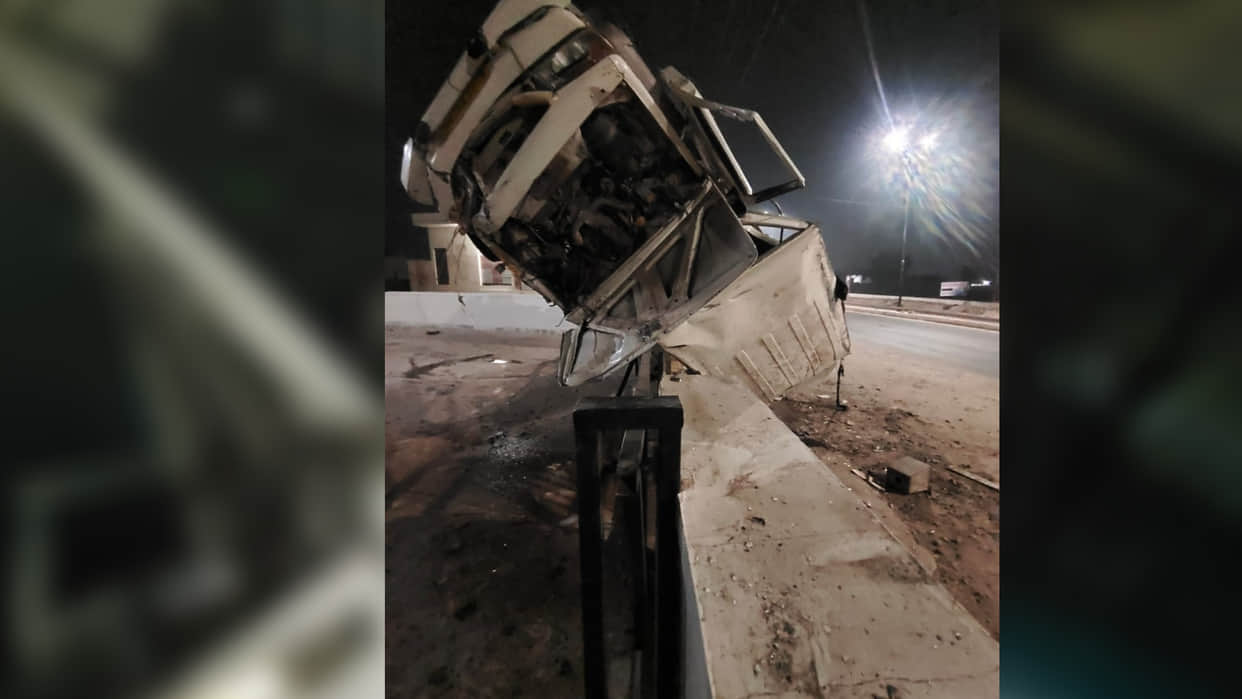 Bolero camper overturned eight times and collided with the gate At night In nagaur