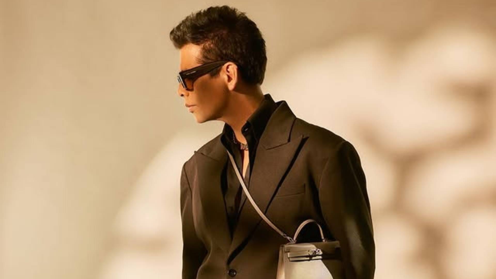 Karan Johar Look in Black Formals with Ladies purse goes viral he says fashion ka koi Gender Nahi hota