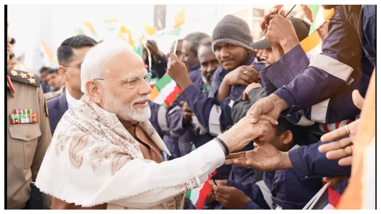 pm modi interacts with indian workers in kuwait gulf labour camp praise them tells development means to him