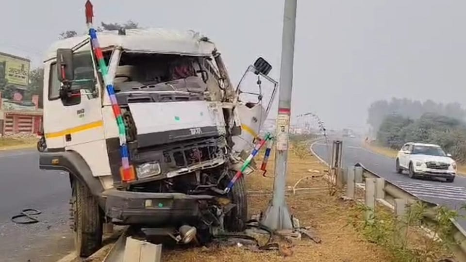 tanker climbed divider and hit the pole