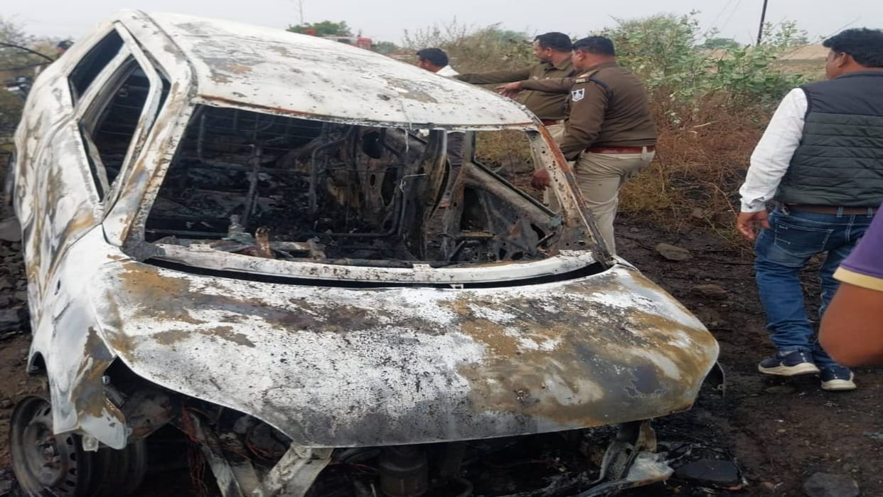 Dhar News Driver dies after being burnt alive in car fire driver was stuck in car during accident
