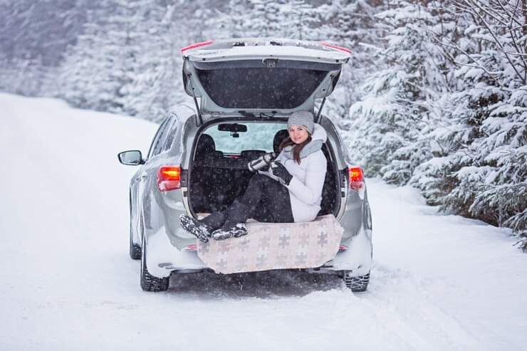 Benefits of driving battery-powered vehicles electric car on icy roads and in snowy conditions