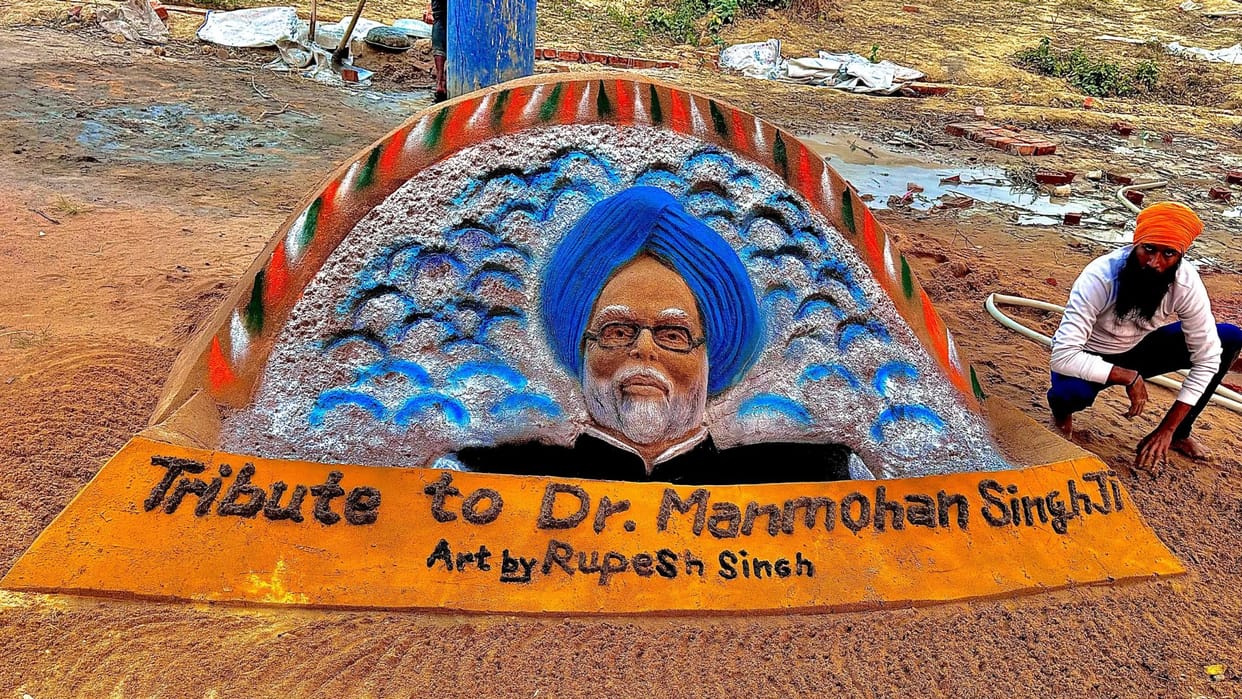 Image of former Prime Minister Dr. Manmohan Singh carved on sand paid homage