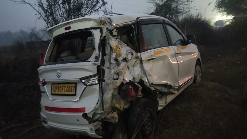 Car overturns in ditch after collision with truck, driver and couple injured