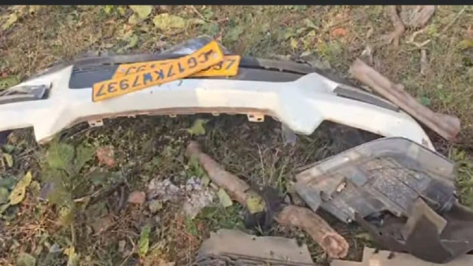 Naxal Attack Vehicle parts found hanging from a tree 15 feet above a seven feet deep crater on ground in Bijap