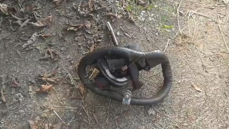 Naxal Attack Vehicle parts found hanging from a tree 15 feet above a seven feet deep crater on ground in Bijap