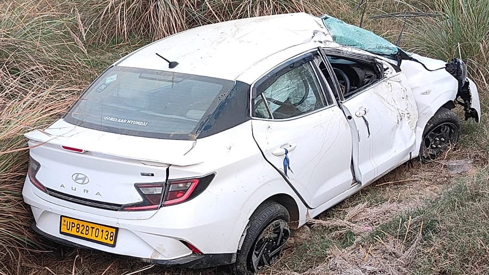 car collided first with divider and then with electric pole