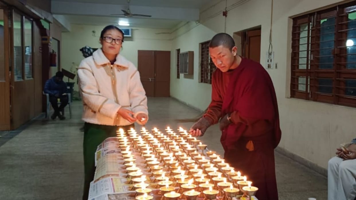 Earthquake in Tibet lamps lit in Kashi dead prayers offered injured Tibetans eyes moist