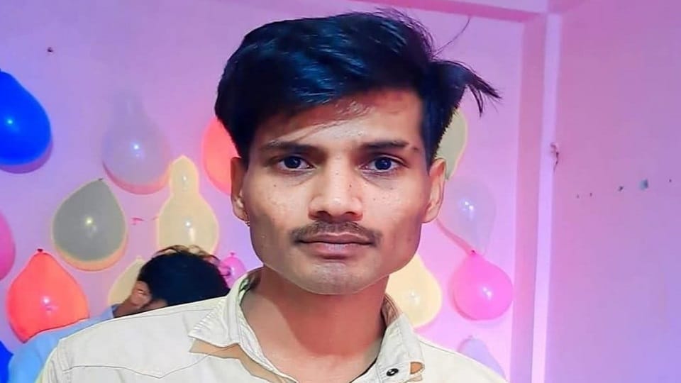 Dead body of young man found, girl sitting nearby