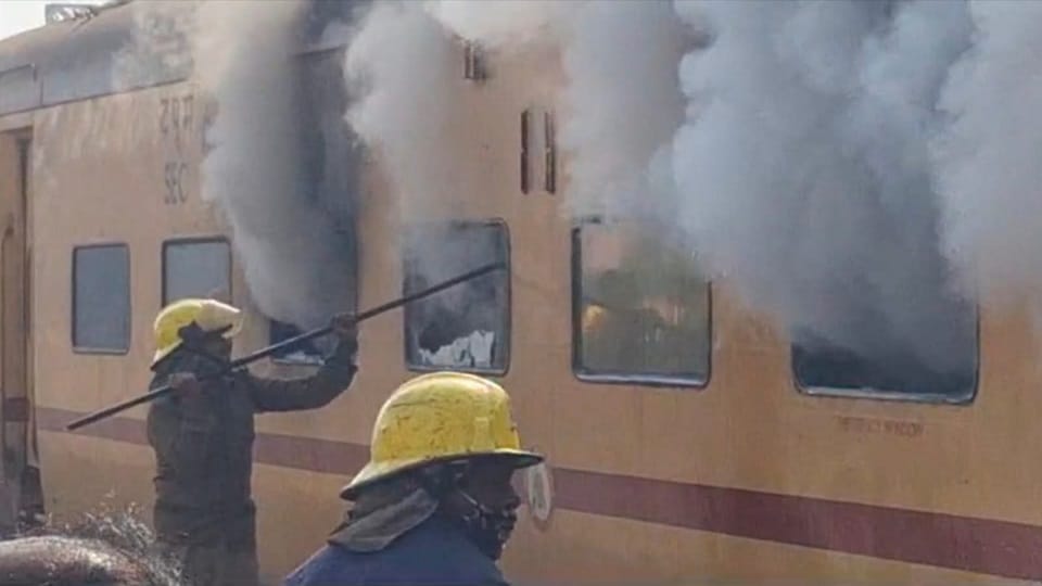Fire broke out in AC bogie of a parked train fire brigade personnel reached the spot possibility of fire due t