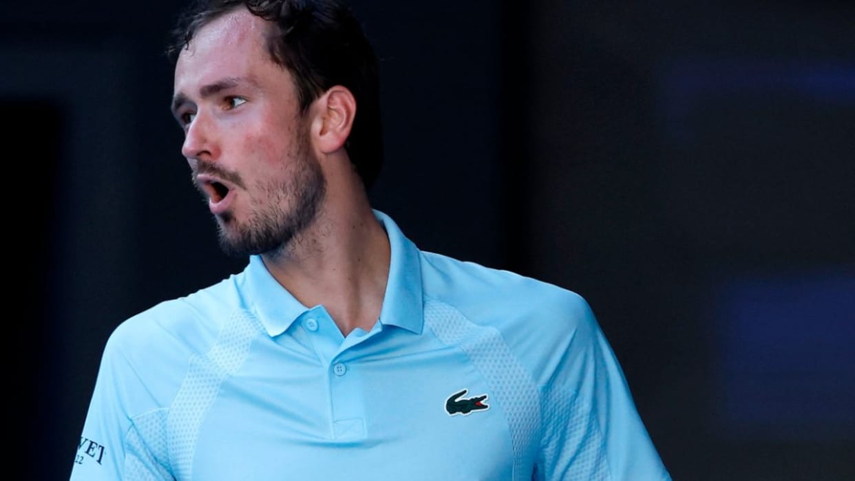 Daniil Medvedev destroys a TV camera attached to the net during his five set Australian Open win