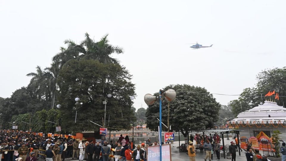 Flowers showered on devotees from a helicopter at the Khichdi mela in Gorakhpur