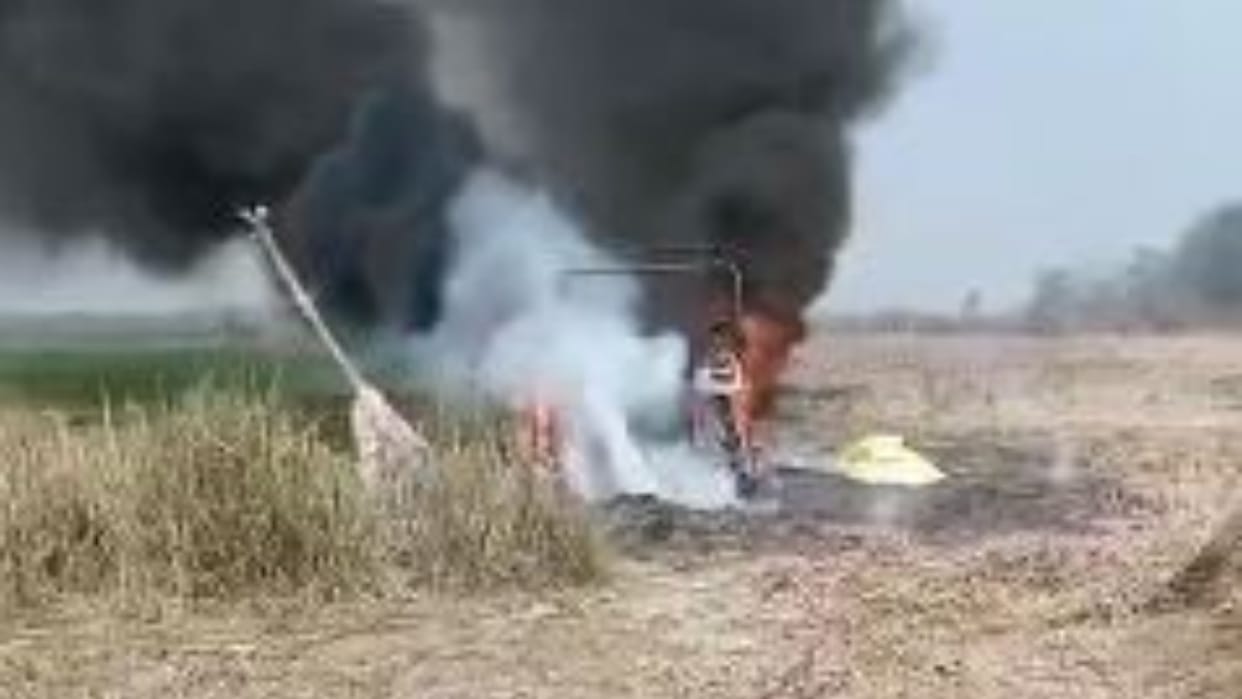 goons burnt the tractor due to land dispute the farmer saved his life by running away with his family in lakhi