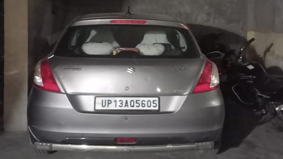 Car parked in garage, toll deducted in Etah
