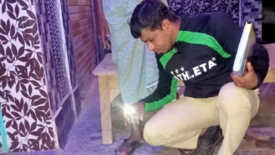 A woman attacked a young man with an axe during a birthday party