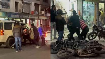 Two youths brutally beat up a youth riding a Scorpio in the middle of road Jwalapur Haridwar