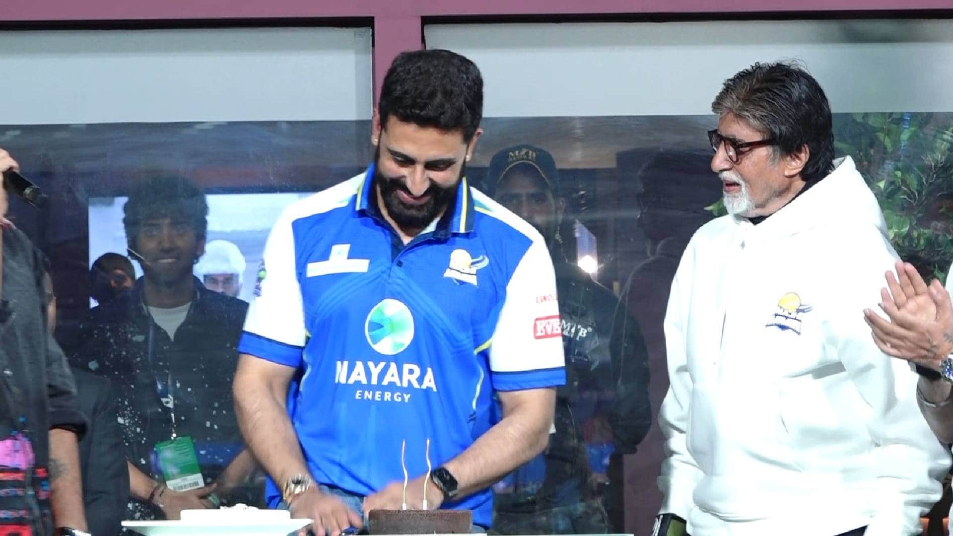 Abhishek Bachchan celebrates 49th birthday with amitabh bachchan by cutting cake son father enjoy ISPL match