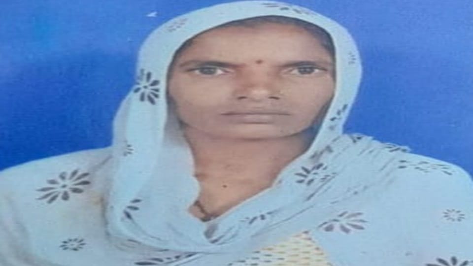 Woman body found in field