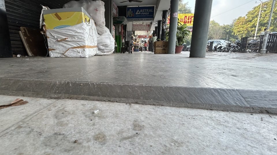 shopkeepers in Chandigarh markets installed tiles and slabs as per their own choice roads became uneven