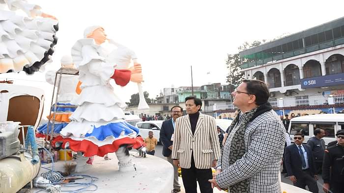 CM Pushkar Singh Dhami painted on a wall in haldwani