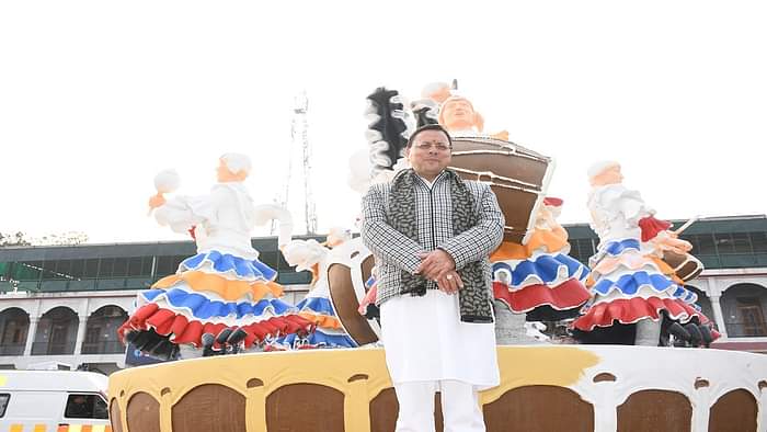 CM Pushkar Singh Dhami painted on a wall in haldwani