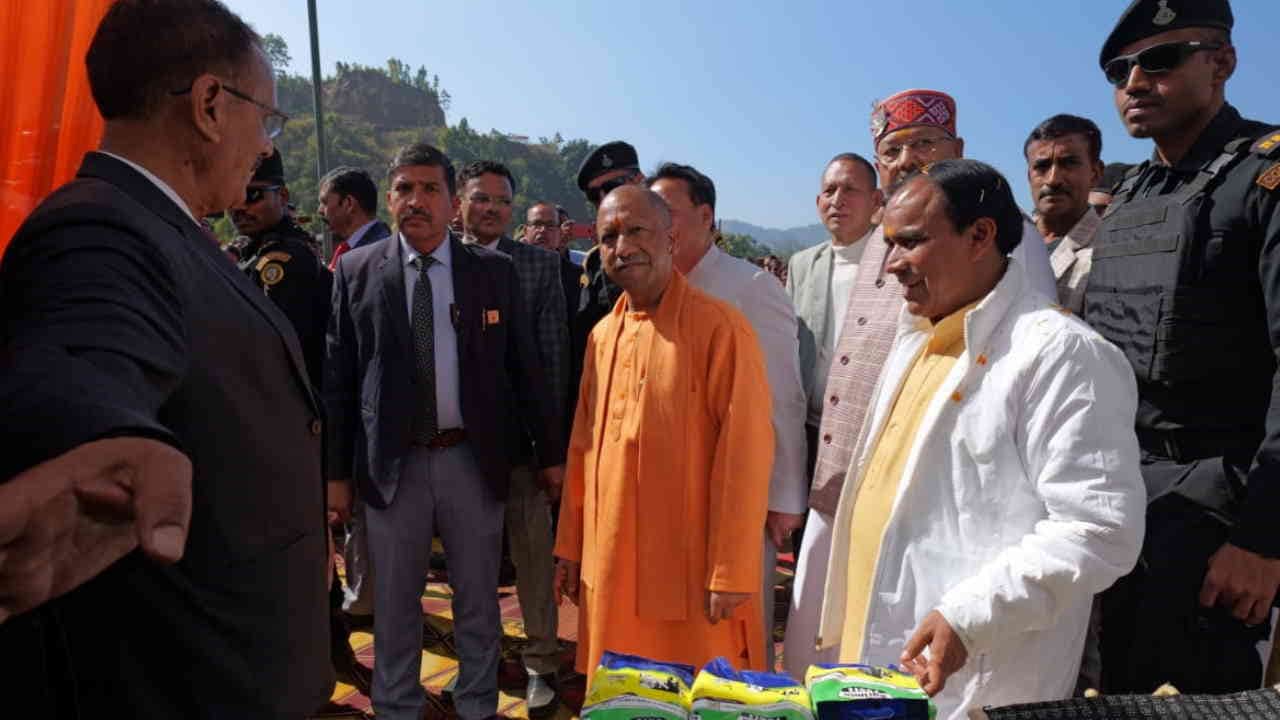 CM Yogi Adityanath Uttarakhand Visit sisters bid farewell to CM Yogi by feeding him curd and sugar