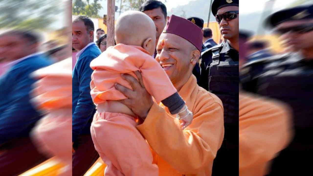 CM Yogi Adityanath Uttarakhand visit seen caressing a child expressed grief over migration and barren fields