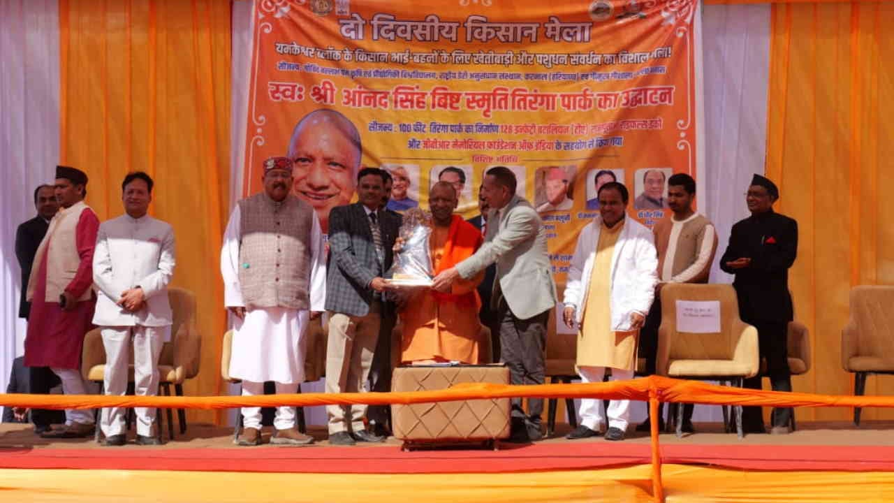 CM Yogi Adityanath Uttarakhand visit seen caressing a child expressed grief over migration and barren fields