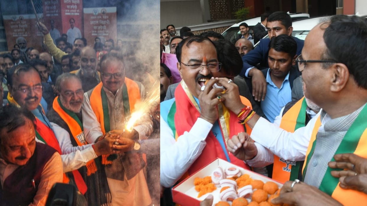 BJP activists celebrate victory in Delhi and Milkipur assembly seat.