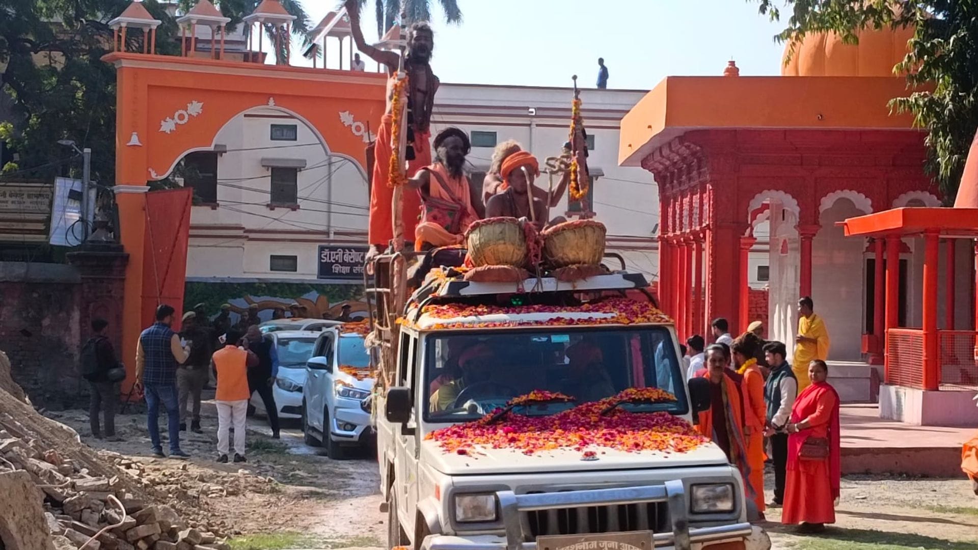 procession of sadhus and sanyasis in Photo flowers showered on way